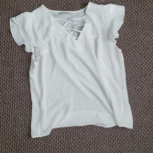 Large white tee with crosses in front